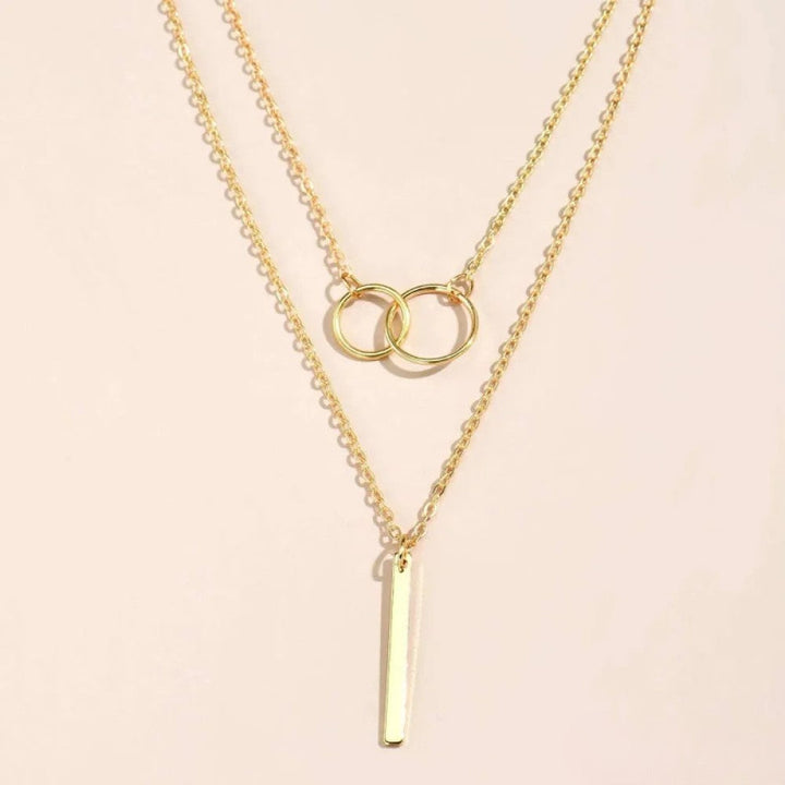 Collier rétro doré à pendentif double cercle