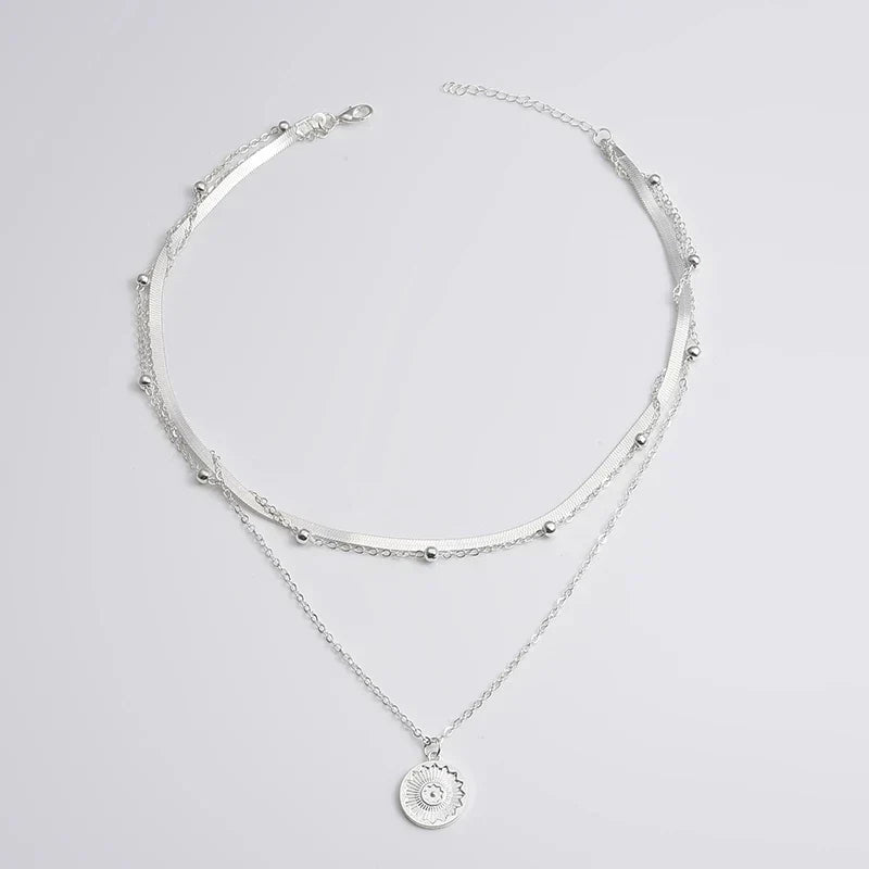 Collier triple