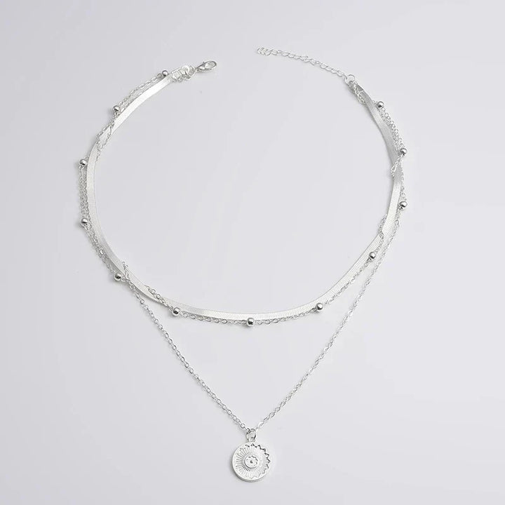 Collier triple