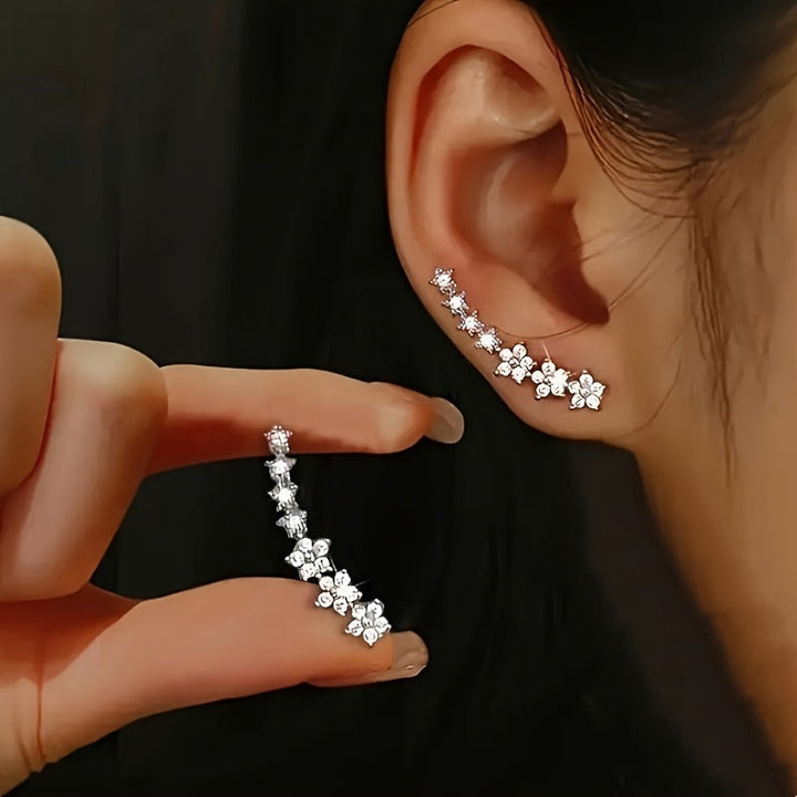 Boucles d'oreilles luxueuses à strass floraux