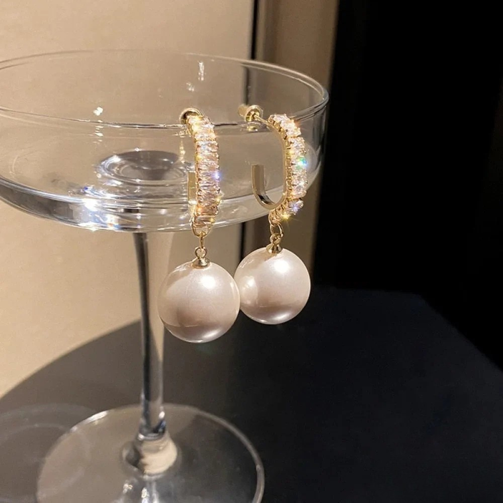 Boucles d’oreilles élégantes à touches de perles