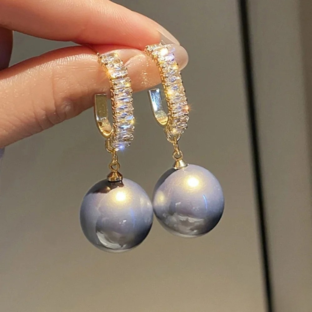 Boucles d’oreilles élégantes à touches de perles