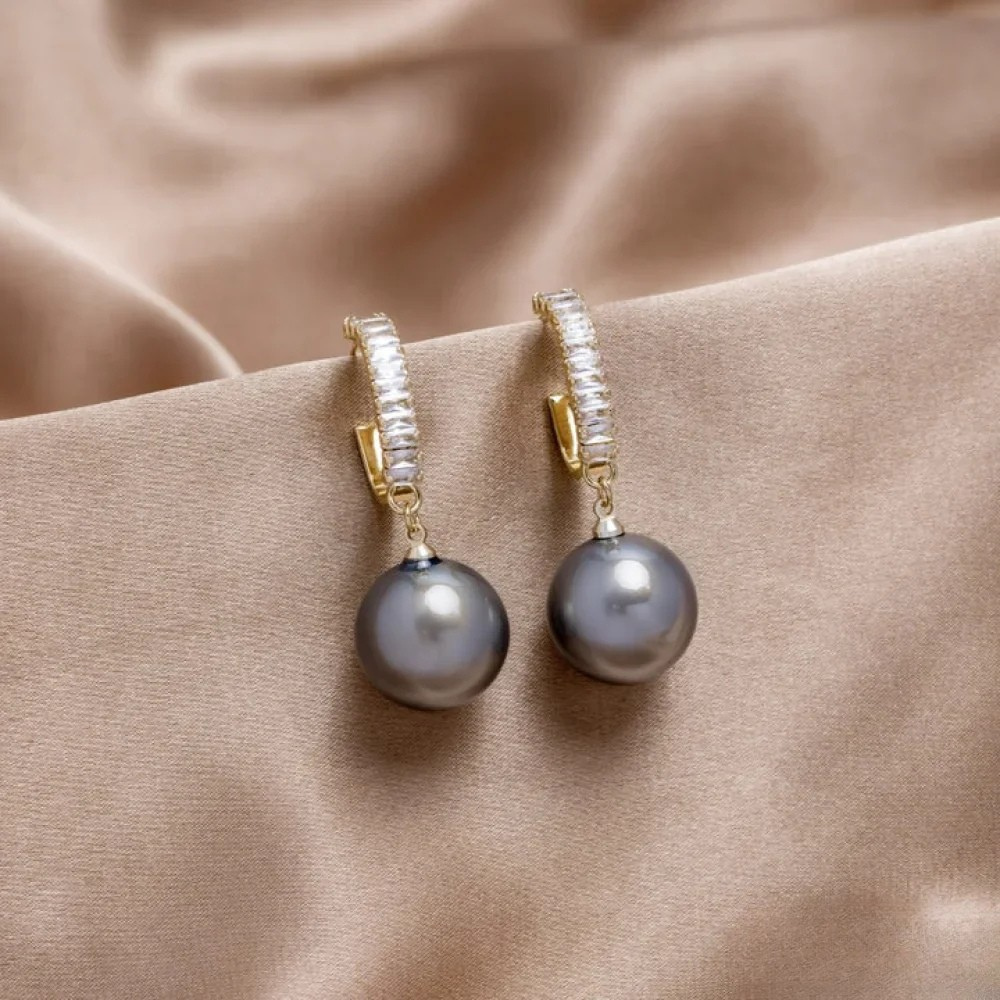 Boucles d’oreilles élégantes à touches de perles