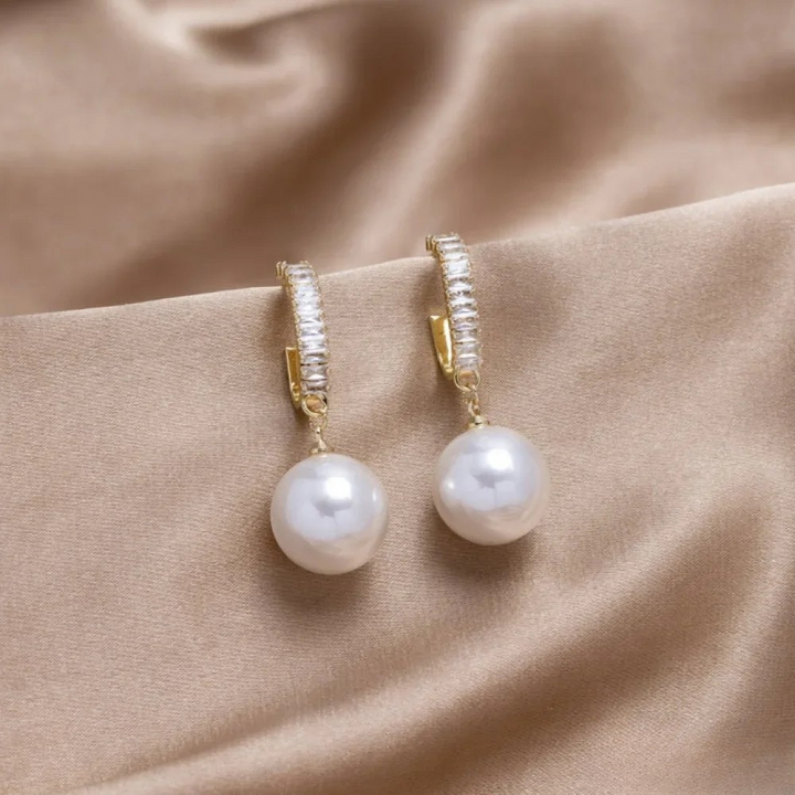 Boucles d’oreilles élégantes à touches de perles
