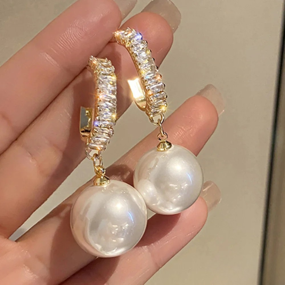 Boucles d’oreilles élégantes à touches de perles