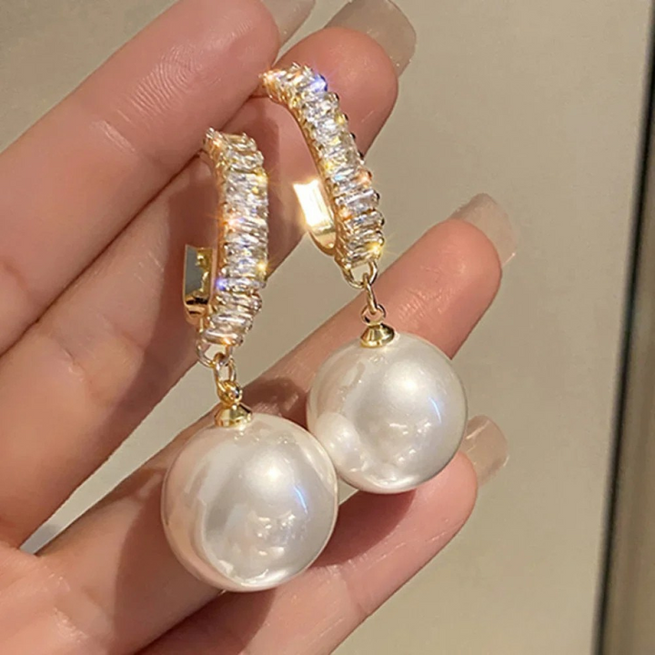 Boucles d’oreilles élégantes à touches de perles