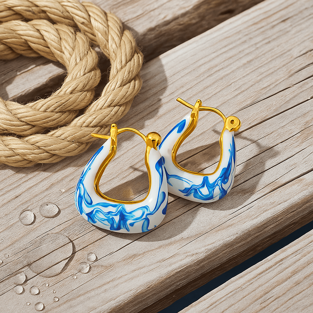 Boucles d'oreilles plume dorées