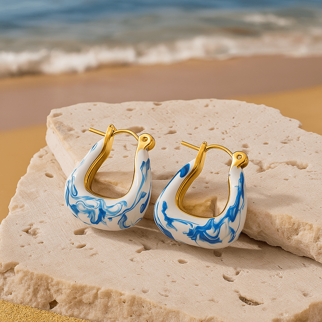 Boucles d'oreilles plume dorées