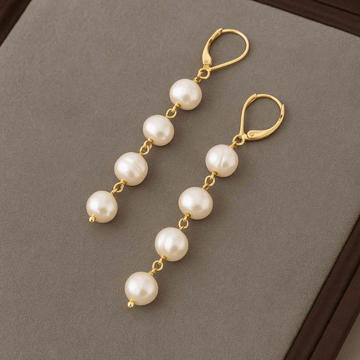 Boucles d’oreilles à pendentif et perle