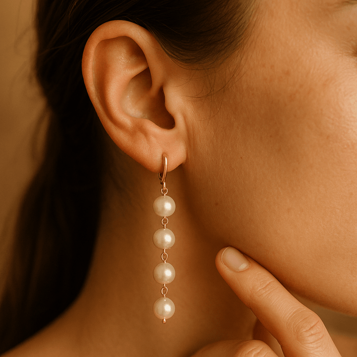 Boucles d’oreilles à pendentif et perle