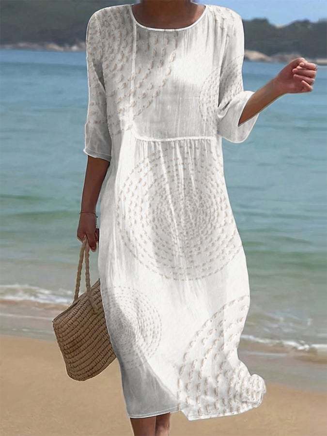 Robe blanche brodée aux jolis détails
