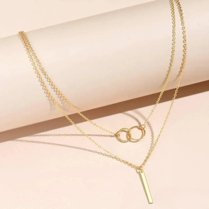 Collier rétro doré à pendentif double cercle