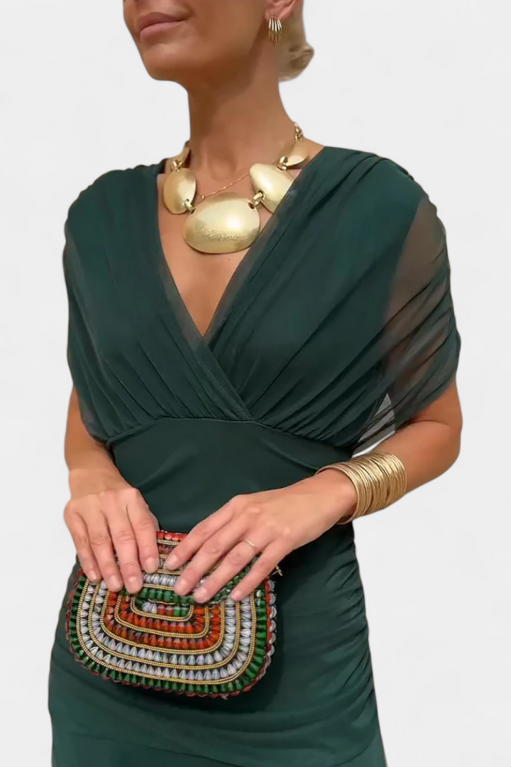 Magda | Longue robe fleurie à col en V et taille plissée